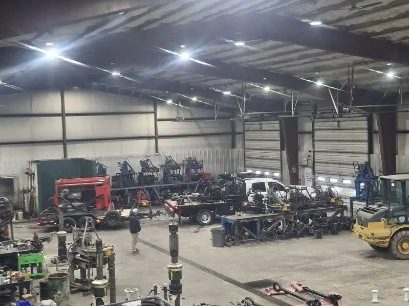 WOS shop interior with CRT trailers and casing running equipment staged for the next job