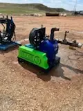 Solids control pump and motor skid staged on a Bakken location