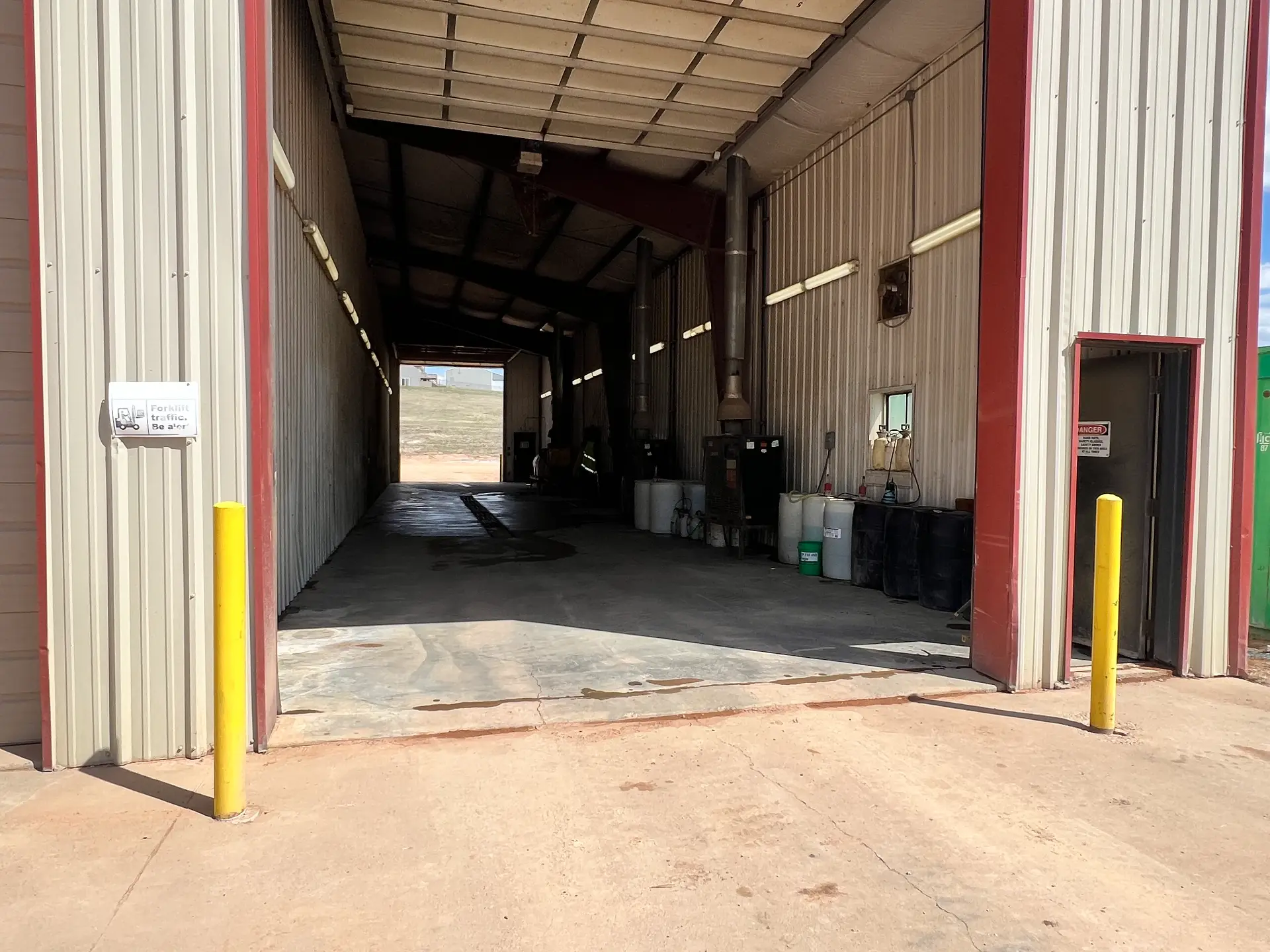 Heated wash bay drive-through entrance