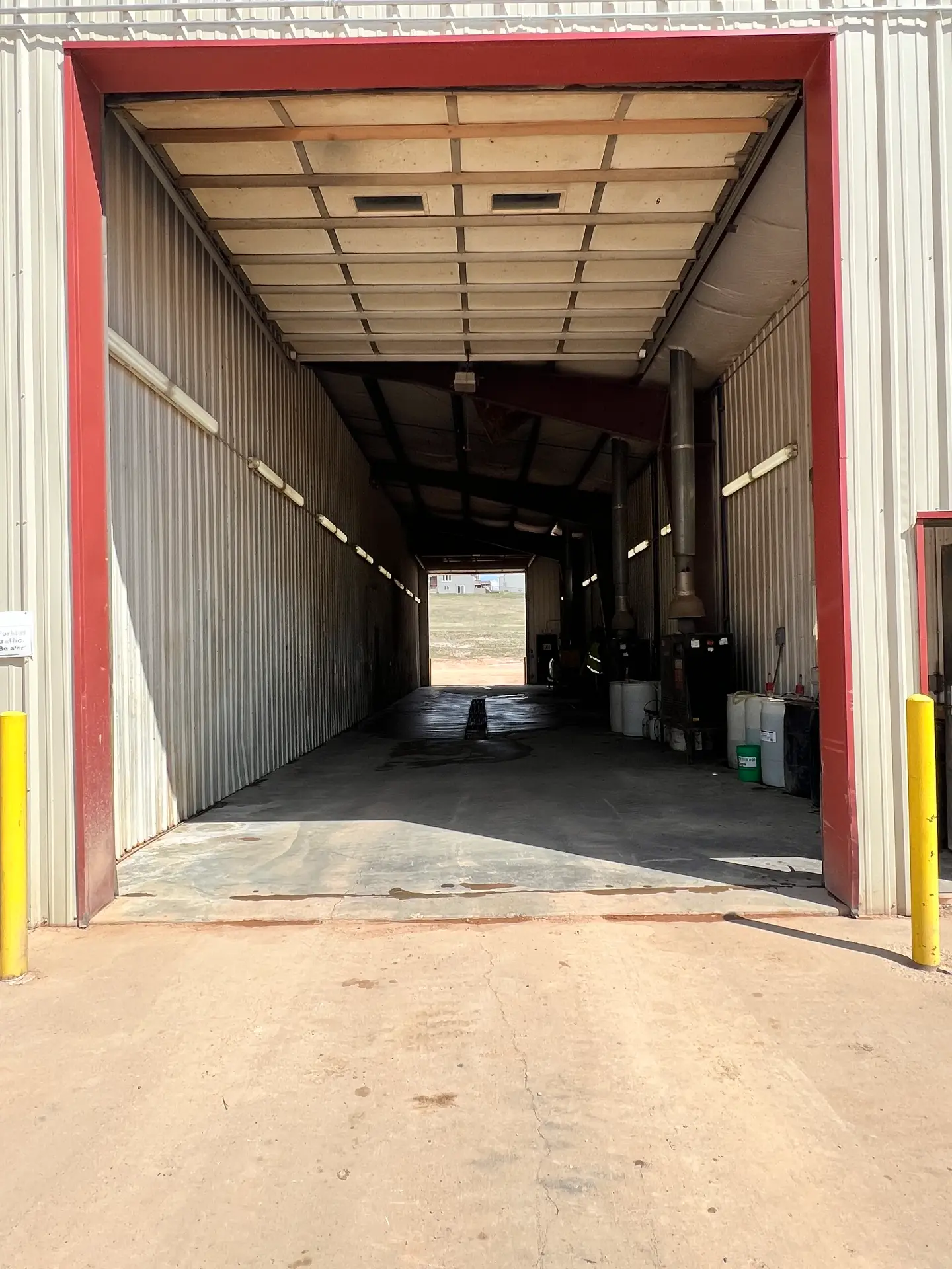 Heated wash bay open-door view through to the yard