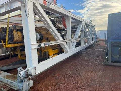 Cleaned rig truss staged on a Bakken yard
