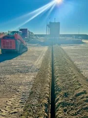 Roustabout trench dug for oilfield piping