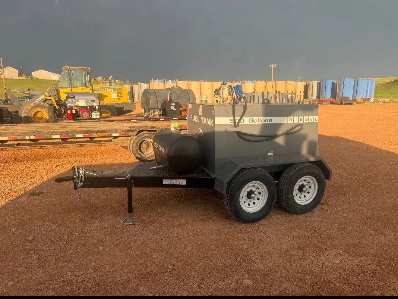 Tandem-axle WOS diesel fuel tank trailer staged on a Bakken drilling location