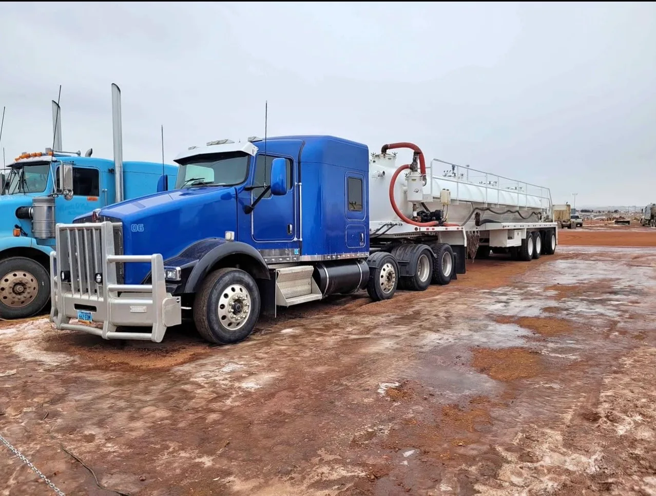 WOS blue service truck on a Bakken pad
